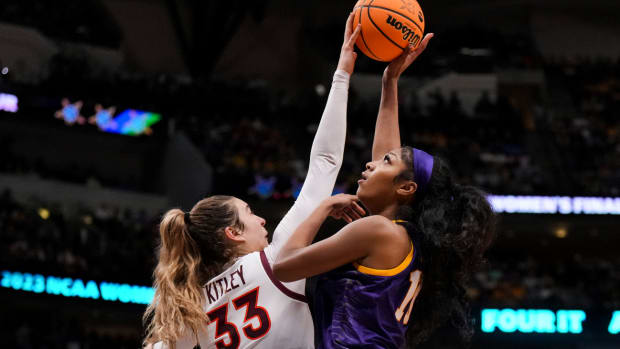 Mar 31, 2023; Dallas, TX, USA; Virginia Tech Hokies center Elizabeth Kitley (33) blocks a shot LSU Lady Tigers forward Angel Reese (10) in the second half in semifinals of the women’s Final Four of the 2023 NCAA Tournament at American Airlines Center.